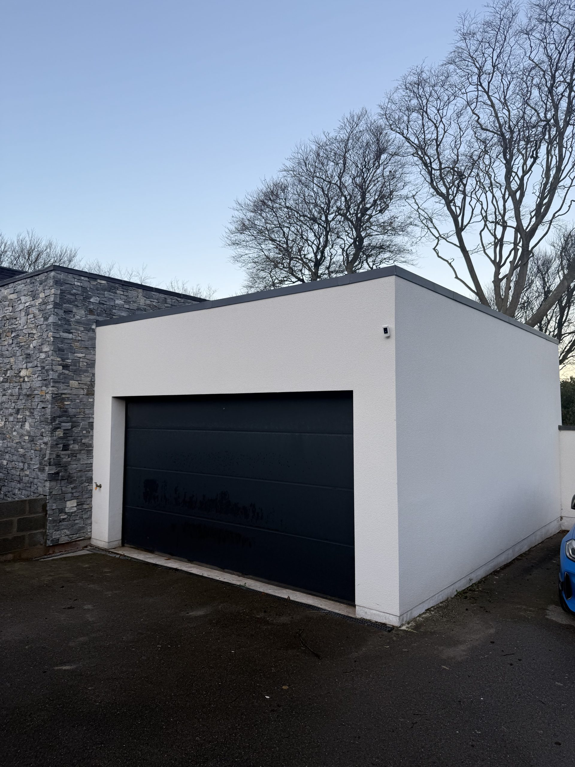 Chalk White silicone render finish on double garage, Portishead